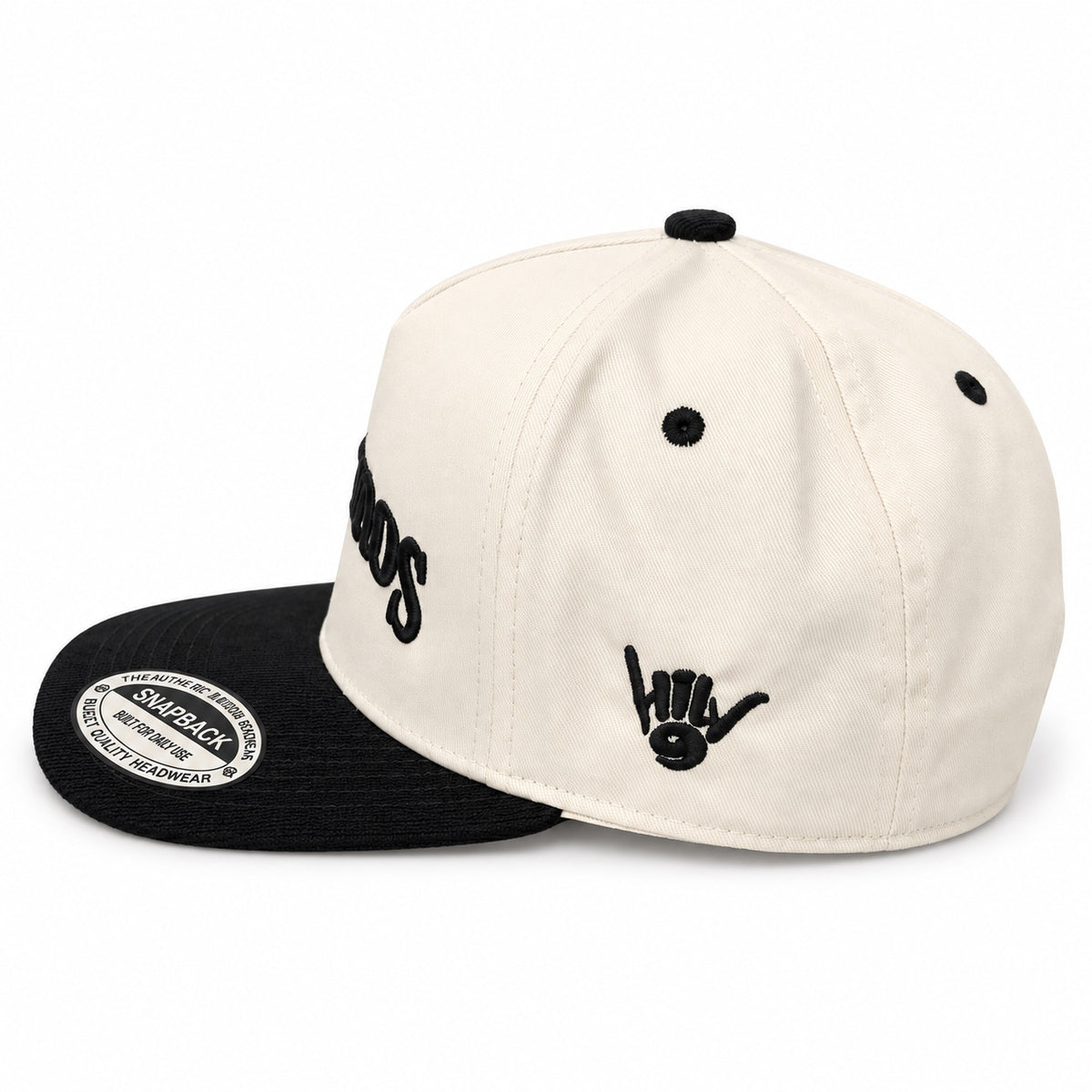 Bald Bros cream and black snapback hat side view