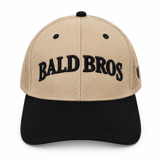 Bald Bros tan and black mesh trucker hat front view